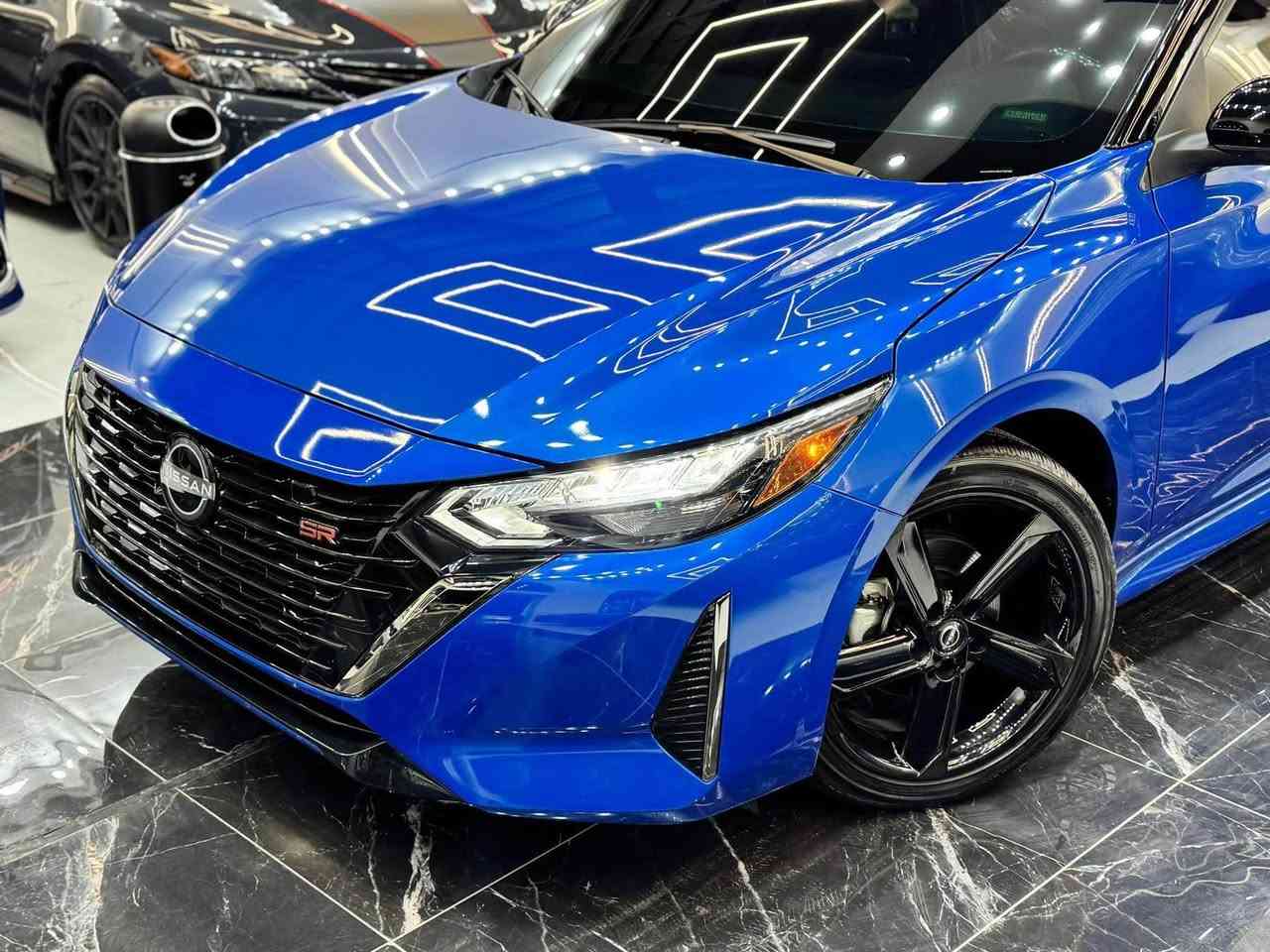 𝟐𝟎𝟐𝟒 𝐍𝐈𝐒𝐒𝐀𝐍 𝐒𝐍𝐓𝐑𝐀-𝐒𝐑.𝐏𝐋𝐔𝐒

نيسان سنترا (𝐒𝐑.𝐏𝐋𝐔𝐒) موديل : 2024

اللون :ازرق مميز سقف اسود بيلادي

عداد المسافة : 674 زيـــرو

حجم المحرك : 2.0L (4.سلندر)

ملاحظة السيارة : فقط ربع جاملغ صبغ بدون دواخل 

كافة الايرباكات سليمة 100%

المواصفات : 𝐒𝐑.𝐏𝐋𝐔𝐒

فول فول مواصفات 1/1

فتحة سقف سلايد 
 بصمة ابواب 
بصمة تشغيل 
تشغيل عن بعد (𝐑𝐄𝐌𝐎𝐓𝐄 𝐒𝐓𝐀𝐑𝐓)
سستم سماعات 🔊 (𝐁𝐎𝐒𝐄)
شاشة دشبول ديجيتال
شحن وايرليس
كاميرا °360
‏‎كاميرا امامي
كاميرا جانبي
كاميرا خلفي
اوتو ستارات (𝐀𝐔𝐓𝐎 𝐒𝐓𝐀𝐑𝐓)
اوتو ستوب (𝐀𝐔𝐓𝐎 𝐒𝐓𝐎𝐏)
رادار امامي (تحديد مسار)
رادار جانبي  (نقاط عمياء)
رادار خلفي (التحذير من الاصطدام)
حساسات امامي
حساسات جانبي 
حساسات خلفي 
نظام (𝐄𝐂𝐎)
نظام (𝐍𝐎𝐑𝐌𝐀𝐋)
نظام (𝐒𝐏𝐎𝐑𝐓)
كشنات جلد
كشنات كهربائي
كشنات هيتر
تحكمات استيرن
استيرن هيتر
تبريد لمس 
تبريد مركزي 
لايتات ليـــLEDـــد عدسة زينون بيلادي
بكلايتات ايـــLEDـــد بيلادي
ويــــل كــــروم  

بعد هواية مواصفات…

‏‎تفاصيل اكثر الاتصال علی ارقام التاليه ‏

☎️***********

☎️***********

‏‎عنوان📍اربيل فرع ناقلات

معرض كاليفورنيا كارس CALIFORNIA Cars أربيل, العراق
