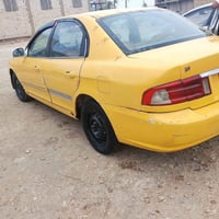 اوبتام • ٢٠٠٢ • مكين وكير