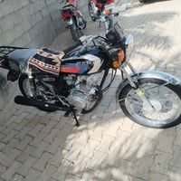 دراجة نارية • مديل 25 • مكان الحر