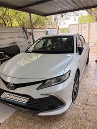 كامري هايبود ٢٠٢٣  ماشية ٢٥ الف  خليجي - عبد اللطيف  فول مواصفات  سيار...