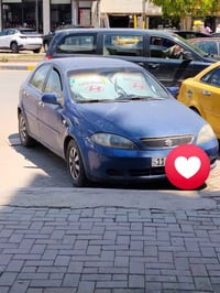سوزوكي فورنزا هاج باك 2006 السياره مانقصها شي بيها بس ضربه بالجاملغ خل...