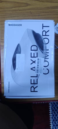 جهاز مساج • يدوي