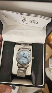 اوتماتيك • ساعة