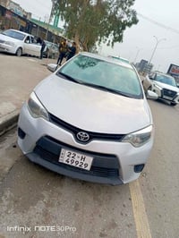 سياره كورلا موديل 2016 ضرر بابين مبدل اصلي اليمين  رقم جديد و هزه جديد...