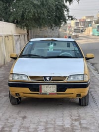 بيجو 405 موديل 2015 برتقالي مصفر السياره مكينه بدايه خيط تبخير والكير ...