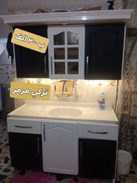 كاونتر تركي بيبان خشب FDr والمنيوم  والسنك مرمر عرضه متر ونص مكاني الش...