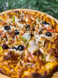 بيتزا وشاورما ابو آدم السوري الزهيرات شارع ساطي مقابل معهد الامراء 077...