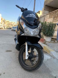 دراجه بي سي اكس لبيع كفاله عامه سعر 11 ورقه شراي يتصل 07711666885 مكان...