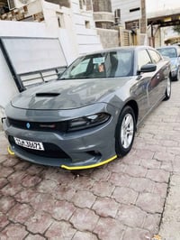 جارجر 2018أصل خليجي لون سمنتي ماشيه 190 الف رقم بغداد جديد انكليزي بسم...