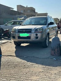 توسان 2009 خليجي  فول موصفات   محرك ٢٠٠ دوش مرغوب  شاشة  كامراة خلفية ...