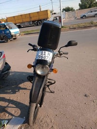 دراجه بوكسر للبيع  النضافه 90٪ اوراق و الارقم انكليزي  السعر مليونين و...