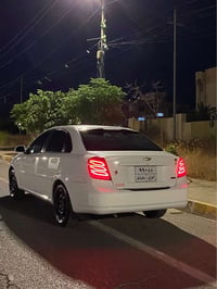 اوپترا • أبيض • ٢٠١١
