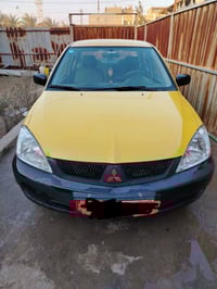 لانسر ٢٠١٠ • ١.٦ • رقم بغداد