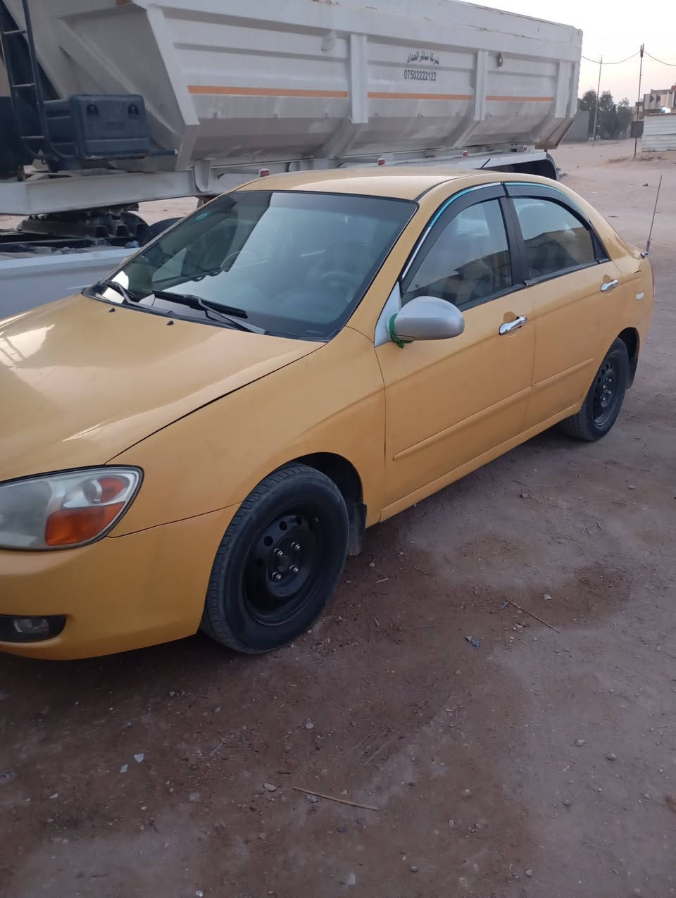 سلام عليكم سبكترا 2009 ليبل واحد مصفره هيئه وغرامات  بيه ضربه في جاملق بجهت عكس السائق مكانه كربلاء رقم ***********
