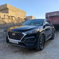 عندي توسان 21 امريكي بيه 6 قطع  بنيد وقبق جنطه ع كد شبر ومصبوغ توحيد ل...