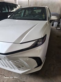 تويوتا كامري هايبرد موديل 2025 الشكل الجديد الصنف XSE رقم بغداد السيار...