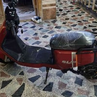 دراجه شحن للبيع بطاريات نص عمر ابيع بس شغاله وعل فحص الكهربائيات كلها ...