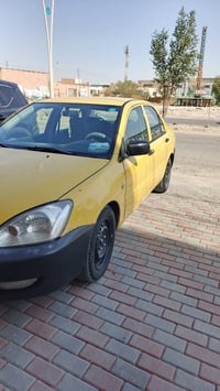 اخوان لانسر موديل 2010كير اوتو  أو مكينه الفين سياره بلاديه بيها بس ال...