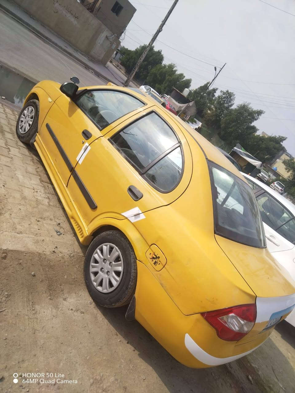 سلام عليكم طيبه مديل 15بسمي مصفرهه هيئه وغرامات وداخله هزه شواصي كفاله وكشر كدامك مكينه وكير جدد تخم تاير وصدر جديد سعر 37وبيهه مجال مكان بغداد رقم ***********
