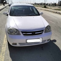 اوبترا 2009 لون أبيض رقم دهوك جديد سنويه 2030 باسمي كابون بانزين محرك ...