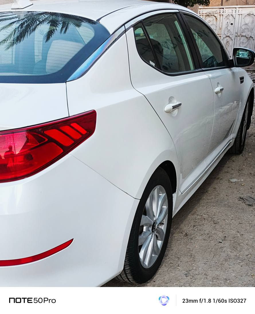 كيا اوبتيما 2015 حره ابيض وارد امريكي  gdi سياره جديده سعرها 117 ورقه تغليف جلد  تبديل بنيد وصبغ جاملغ بدون ايرباك للاستفسار *********** الشطره, ذي قار
