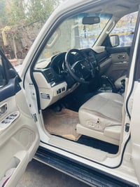 باجيرو حبتور موديل 2010 رقم بغداد بيه قطعه صبغ جاملغ امامي محوره غاز ا...