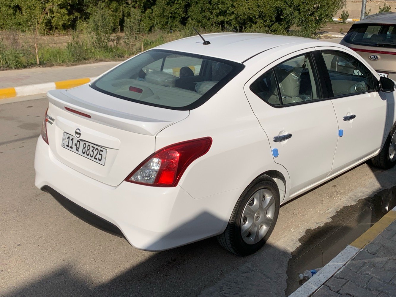 نيسان سني قطعتين تبريد اشاير بالمري شاشه كامره رقم بغداد باسمي موديل ٢٠٢٥ ماشيه ٢٨ اخت زيرو كفاله عامه بيع او مراوس