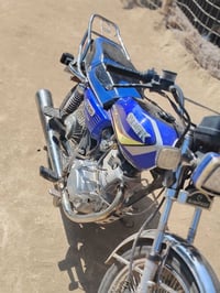 تايكر • موديل ٢٣ • محرك ما مفتوح