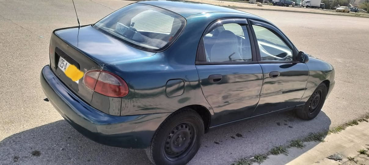 دايو لانوس موديل ((1997)) سنويه جديده بأسمي شرط التحويل لغايه ((2030)) رقم دولي كركوك كوبون بانزين بيها  كهربائيات كلها شغاله تدفئه شغال تبريد نقص كومبريسر محرك 16 بيها خيط بخار بدون تنقيص داخلها نظيفه صبغ عام بيها معجون تصفيه حزام بدون دواخل مكان السياره كركوك  ((***********)) السعر(( 40)) كركوك, العراق
