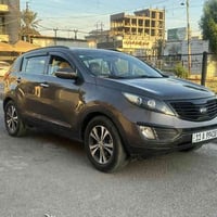 سبورتج 2012 خليجي للبيع فقط  بجم كبس ماشيه 124 الف  فول موصفات  بنورام...