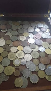 عملات معدنية • ٤٥٠قطعة • ٥٨+دولة