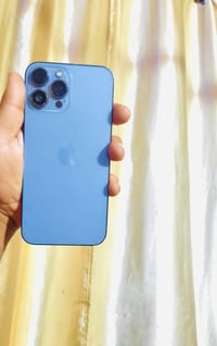 ايفون ١٣ برو ماكس شرق اوسط تك خط  ذاكره ١٢٨ لون بحري  جهاز وتر بروف  ف...