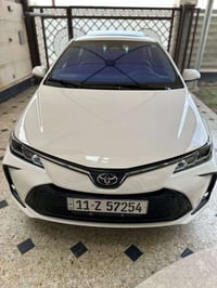 …. للبيع تويوتا كورلا هايبرد صيني 2025( شكل الخليجي ) مكفولة سلايد روف...