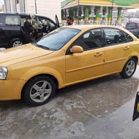 اوبترا ٢٠١١ بغداد شركه صبغ جاملغ خلفي ودعاميه سياره رقم جديد مصفره تبر...