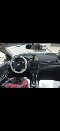 افيو 2009 خليجي / كوري رقم نينوى  كوبون بانزين محرك وكير شرط  07511159...