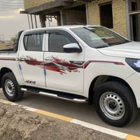 هايلوكس 2021 فورويل (دفع رباعي) بانزين  مكان بارد واحد فقط  كير اوتمات...