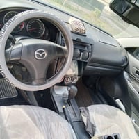 للبيع مازدا 2003مكينه 2000بيها صبغ عام جماليه سياره جديده مابيها اي نق...