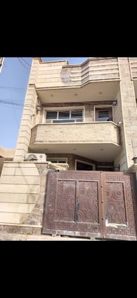 البلديات حي التجار • طابو ملك صرف • ١٠٠م