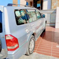 سياره باجيرو للبيع  2004 لون رصاصي صبغ ما بيها شبل بل جاملغ الخلفي كشن...