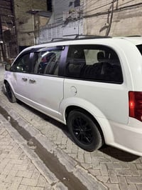 دوج كرفان موديل 2020 GT وارد امريكي رقم بغداد ، الضرر مالها چاملغ السا...