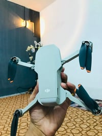 درون DJI • ميني ٢ • بطاريات ٣