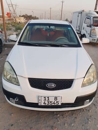 كيا ريو 2009خليجي 1600بيه قطع صبغ بس اني ابيع احزام رقم بغداد بسمي شرط...