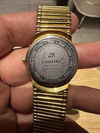 ساعة لاورين • اصلية • مطليه ذهب
