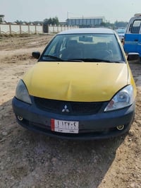 لانسر 2008 • اوتوماتيك • بعقوبه