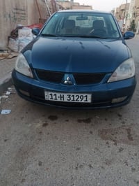 شباب  سيارة لانسره موديل،2007 كير مكينه، كفالة، تبريد،ويه، شوية سيارة ...