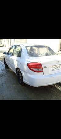 كيه ريو موديل 2005جاهزه رقم قادسية السعر 16ورقه وبيها مجال راعيها متوف...