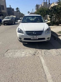 نيسان التيما2007 رقم بغداد بسمي خليجي بيه قطع صبغ بدون دواخل اثر شخوط ...