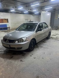 لانسر ٢٠٠٧ • محرك جديد • رقم اربيل