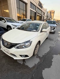 نيسان سنترا 2025 زيرو  فول  ‎رقم بغداد  ‎ضمان شركة السور الموزع الرسمي...