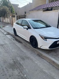كورلا هايبرد  مبدل جاملغ وربع الباب مصبوغ ماشيه 27 مكان سياره بغداد ال...